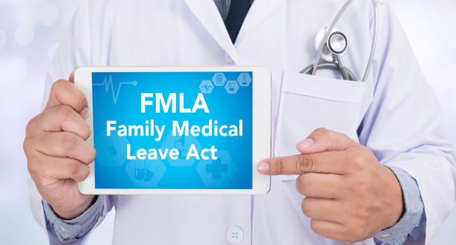 Doctor holding an ipad that says FMLA Family Medical Leave Act