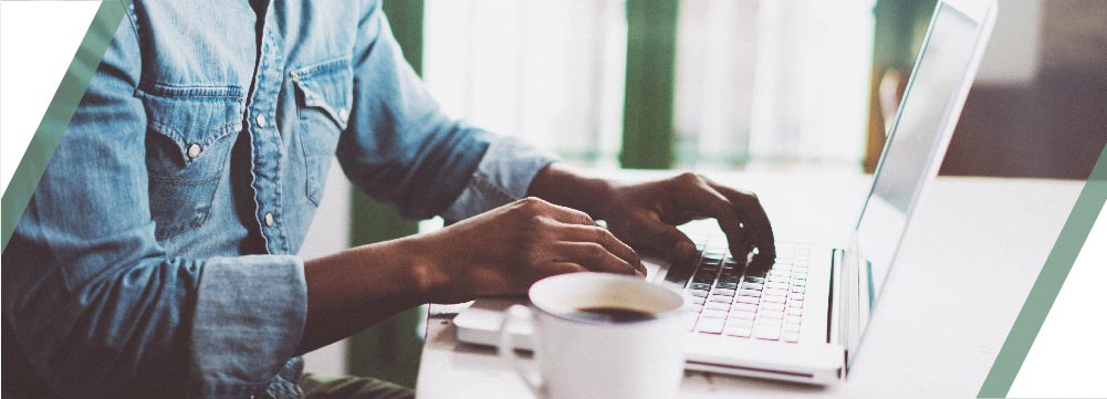 Person working on laptop.