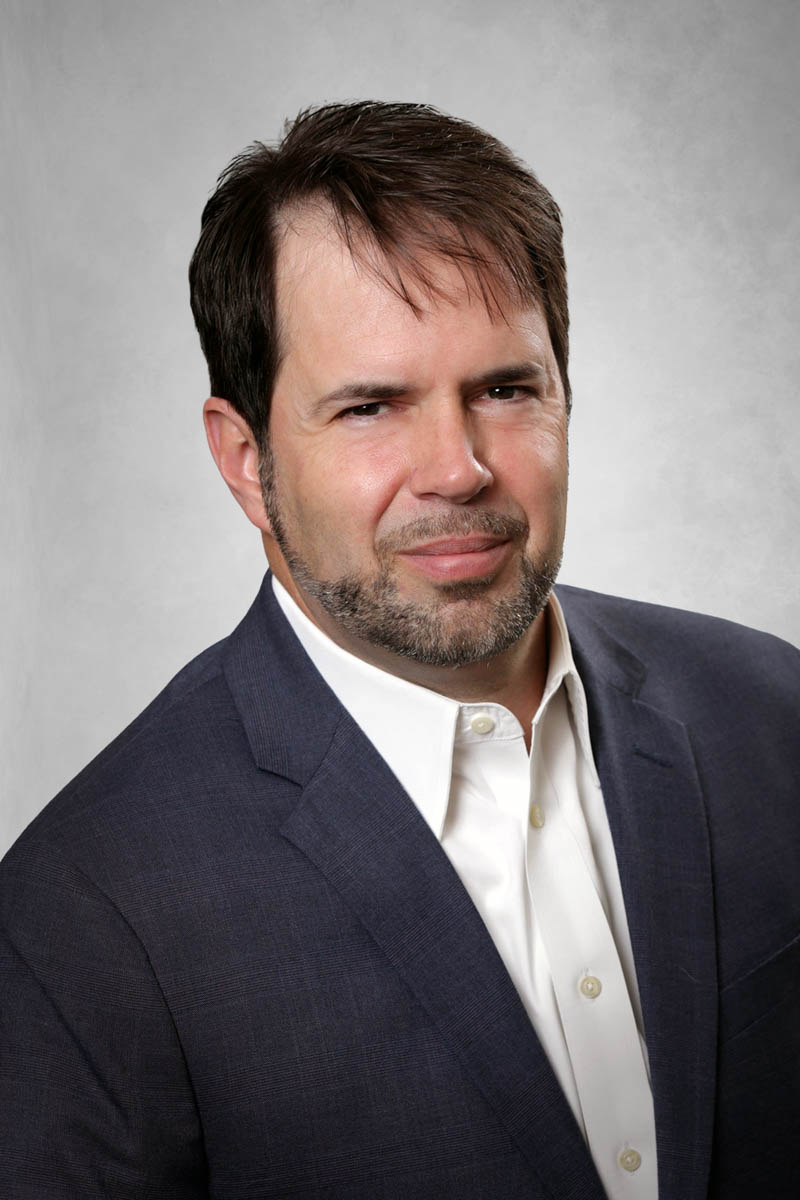 Eric J. Plinke headshot.