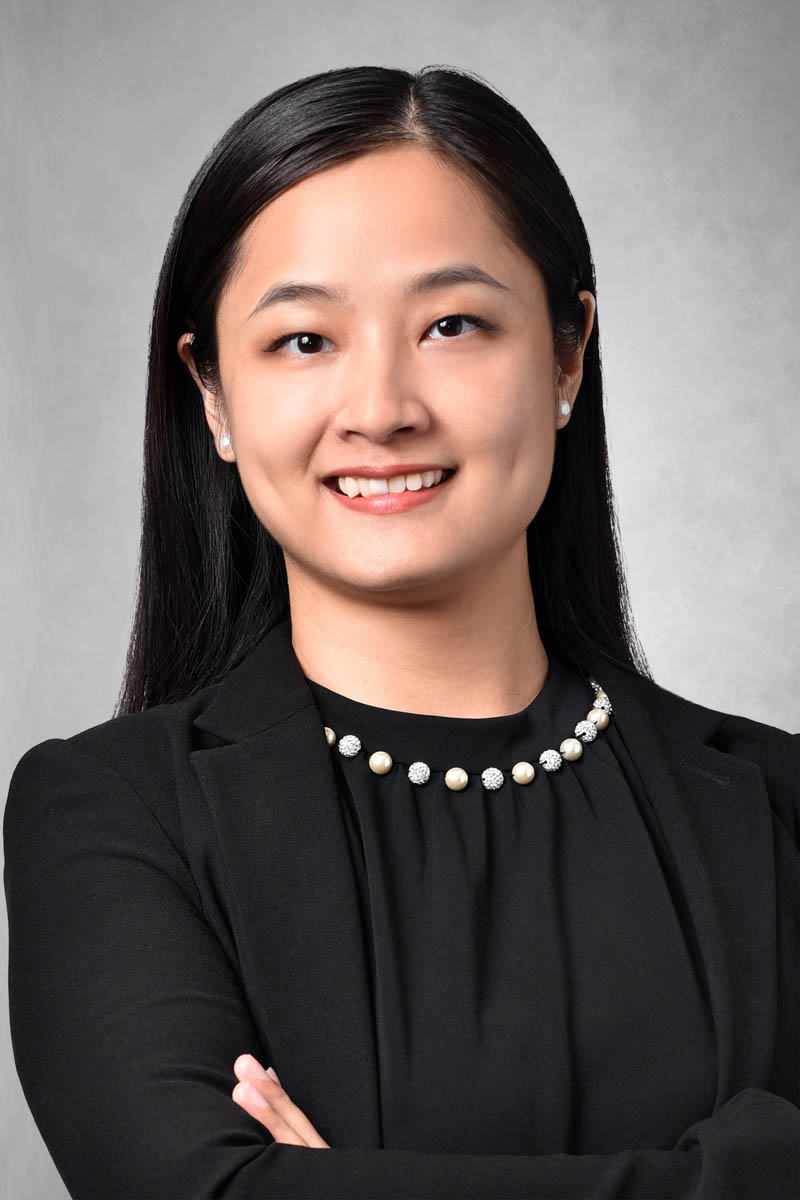 Fuxing “Amber” Sai headshot.