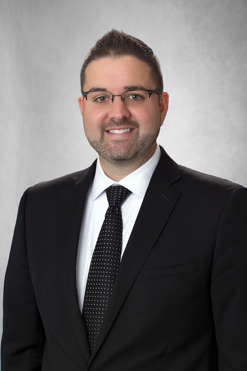 J. Travis Mihelick headshot.