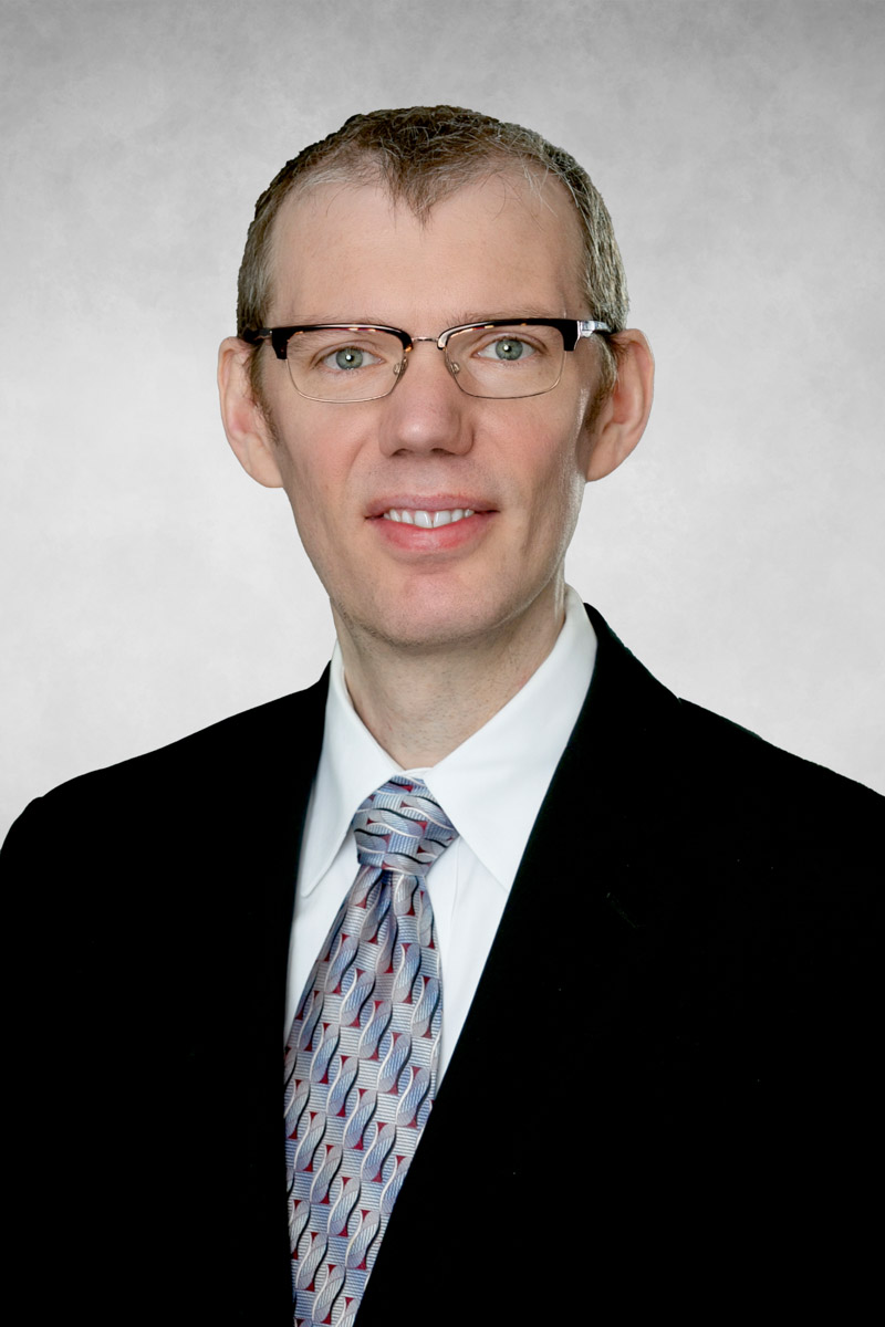 Justin B. Foster headshot.