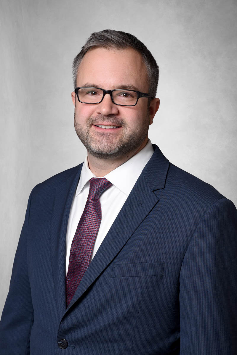 J. Andrew Recker headshot.