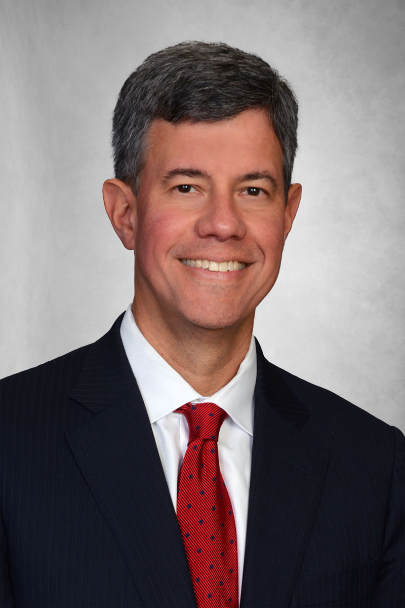 James E. Cole headshot.