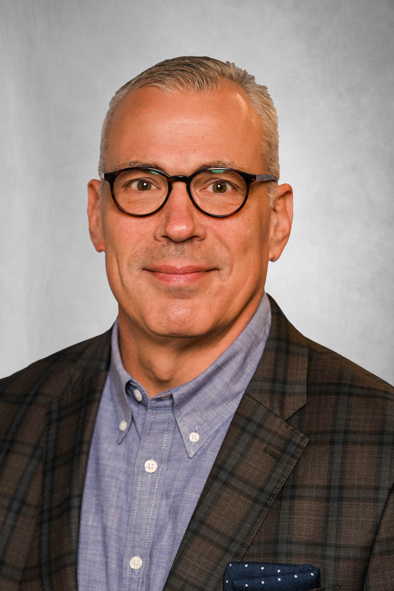 James A. Dimitrijevs headshot.