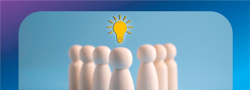 Wooden pegs with an idea lightbulb